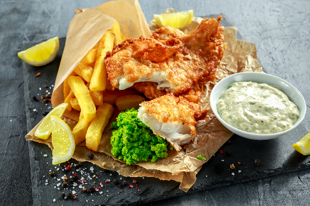 Homemade fish and chips with mushy peas